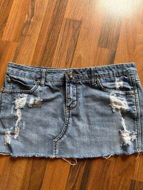 Vanity Distressed Denim Mini Skirt with Frayed Hem